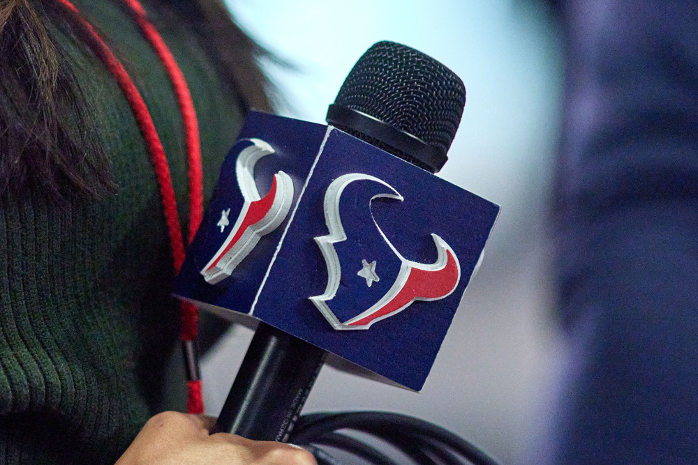 Texans logo on microphone at the NFL Combine