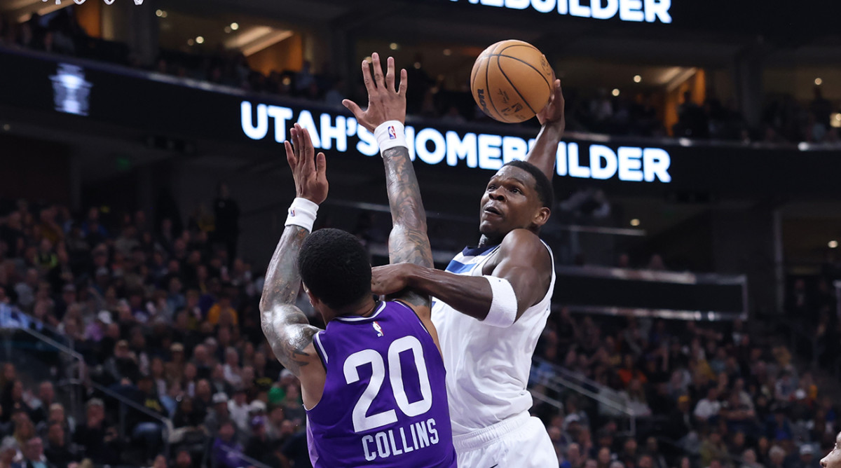 Anthony Edwards throws down massive poster over John Collins