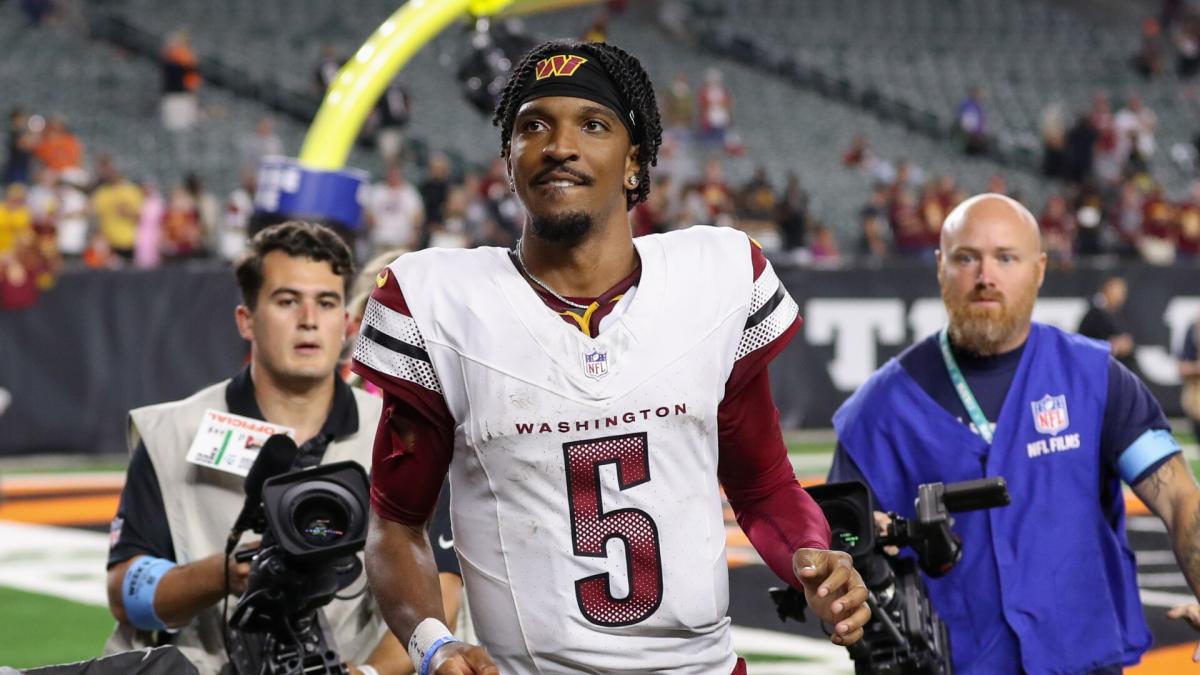 Jayden Daniels walking off the field