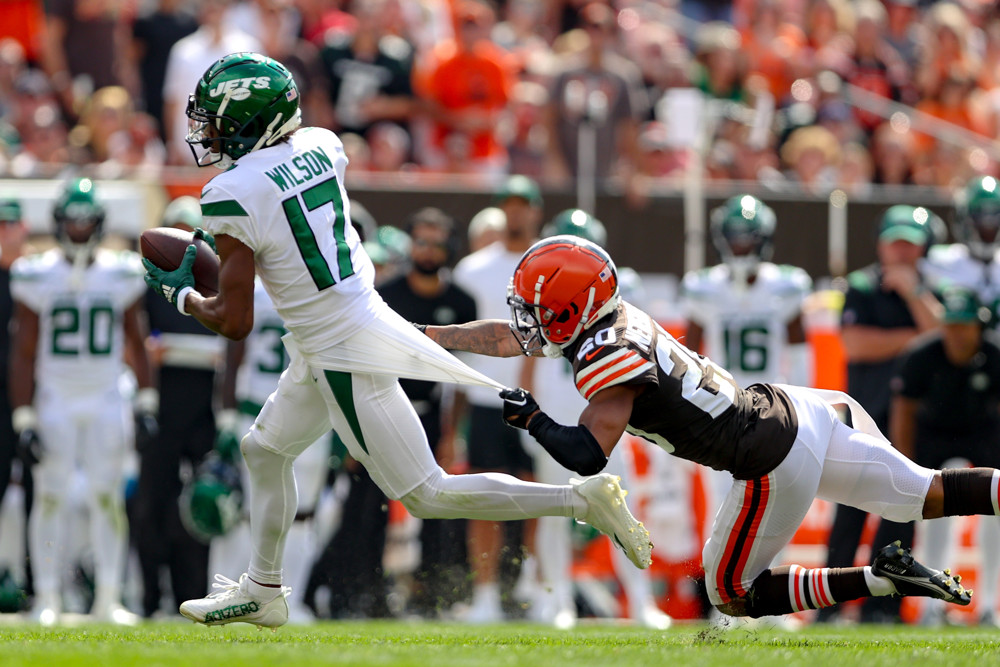 Wide Receiver Garrett Wilson Breaks a Tackle From a Browns Defender